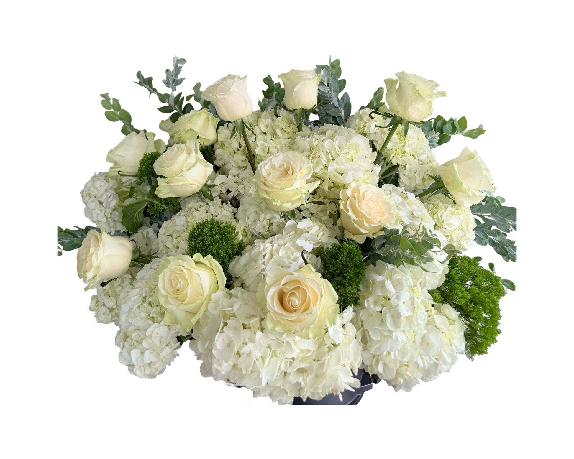 A luxurious floral arrangement featuring ivory roses, white hydrangeas, green moss accents, and soft filler greenery, all presented in a classic rounded design. This serene and cloud-like bouquet is perfect for sympathy, weddings, or sophisticated celebrations where simplicity and elegance are key.