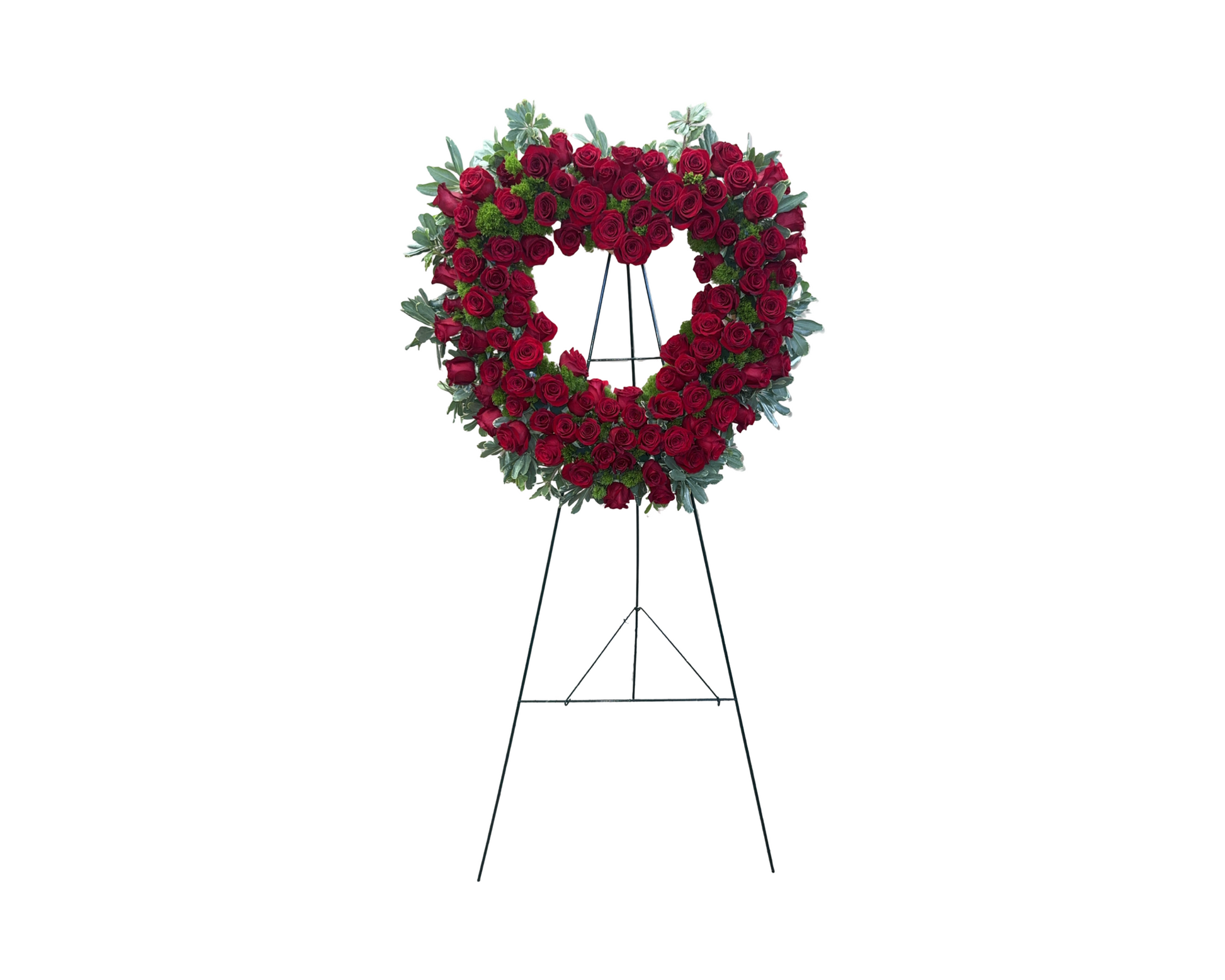 A traditional heart-shaped sympathy wreath made entirely of red roses with accents of eucalyptus greenery, displayed on a black easel. This romantic and dignified floral tribute conveys deep love and respect, making it an elegant choice for funerals, memorial services, or commemorative events.