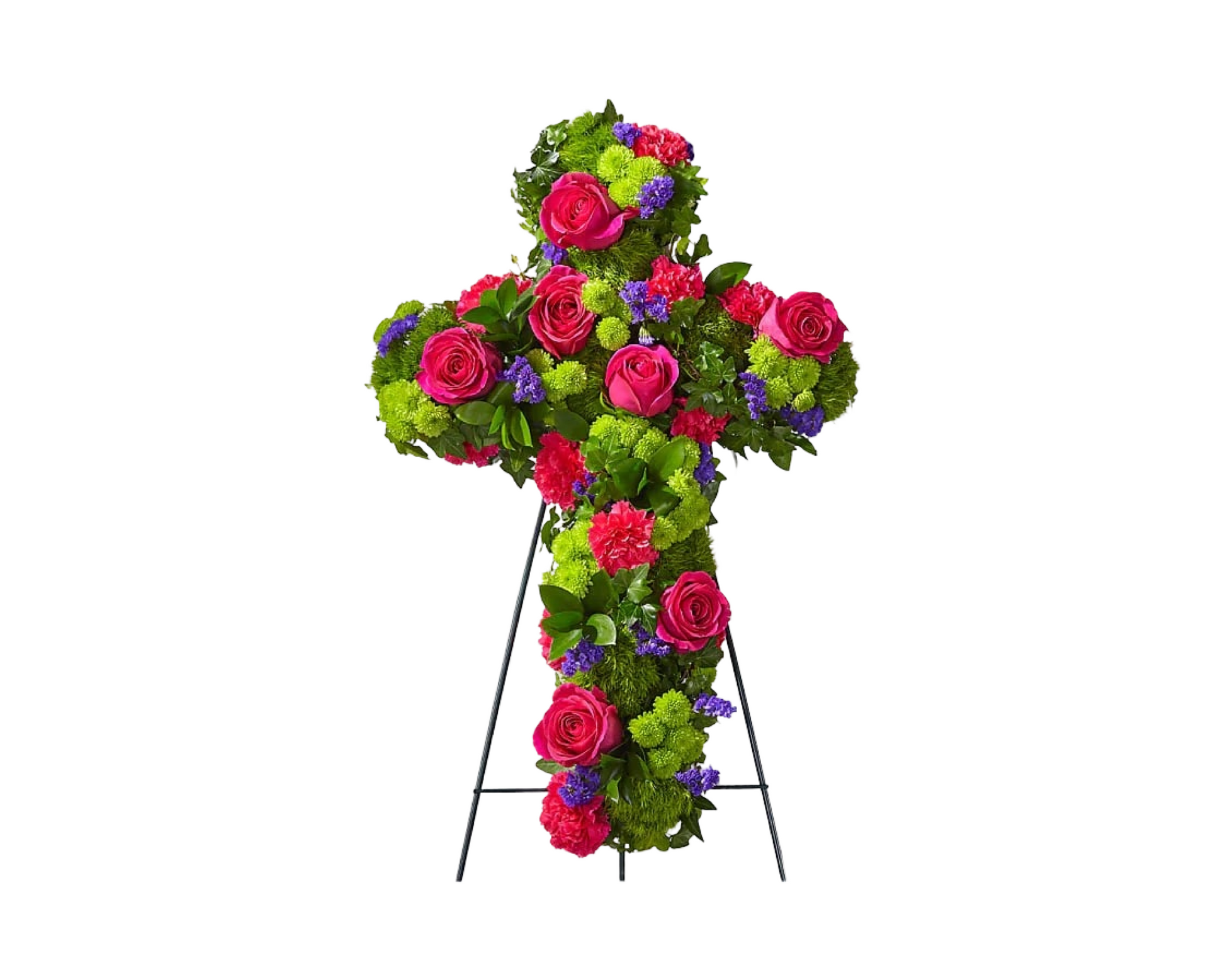 A bold and colorful sympathy cross standing spray arranged on a black metal easel. This tribute features hot pink roses, red carnations, green button chrysanthemums, purple statice, and lush greenery. The striking color palette brings a joyful expression of life and remembrance—ideal for celebrations of life or contemporary memorial services.